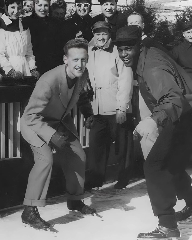Vin Scully and Jackie Robinson prepare to race on ice