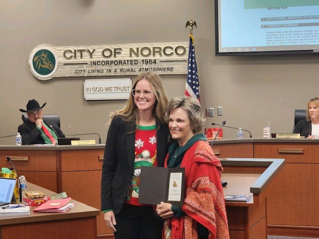 Karen Swanson '77 presented commendation from City of Norco