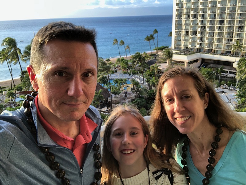 Joe '93 and Whitney, MBA '05,  Novak with daughter, Sierra