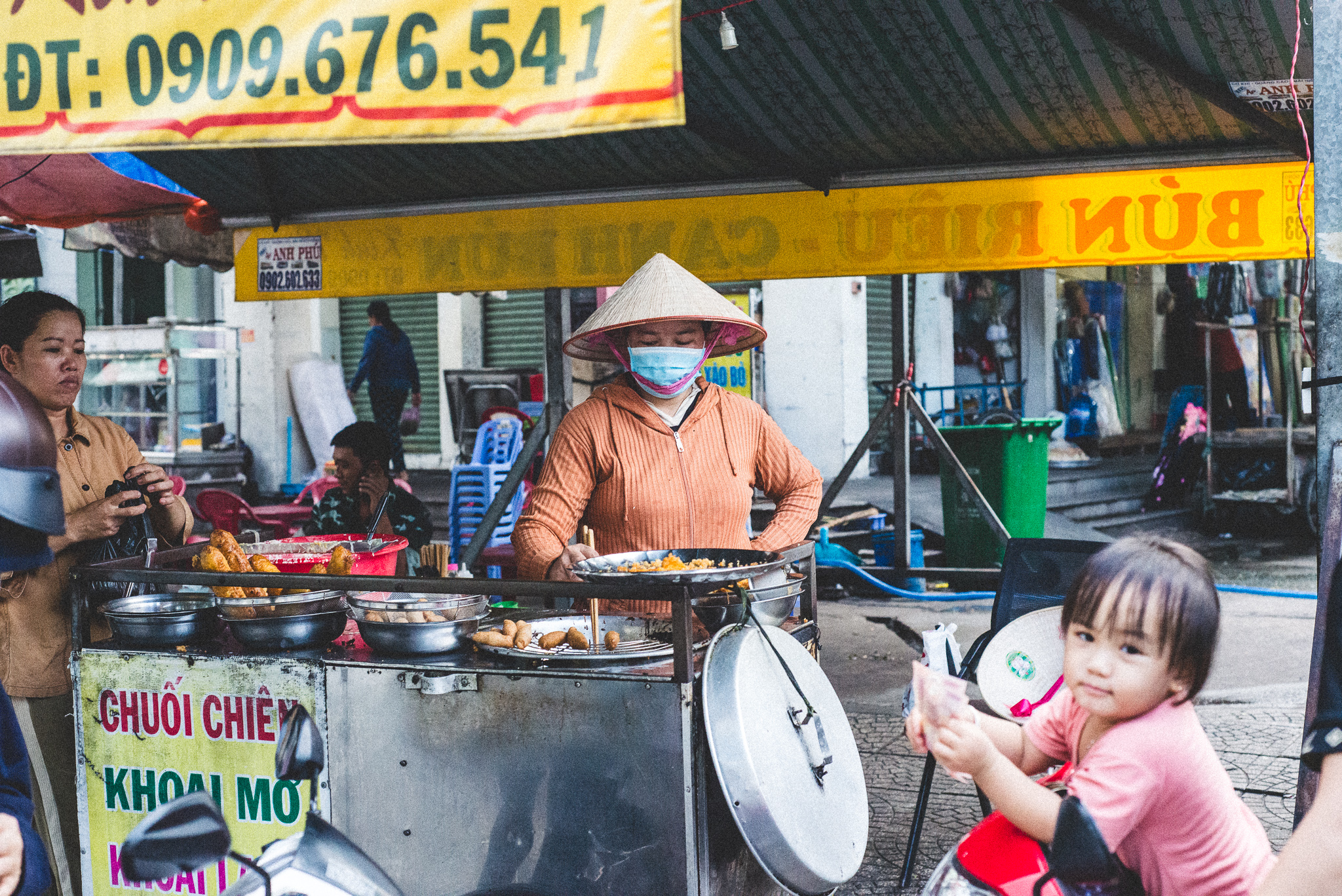 Street Vendor in Ho Chi Minh City by Hon Hoang