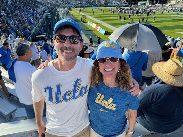 Dean and Jennifer Poulakidas - football vs. Hawaii - 2024