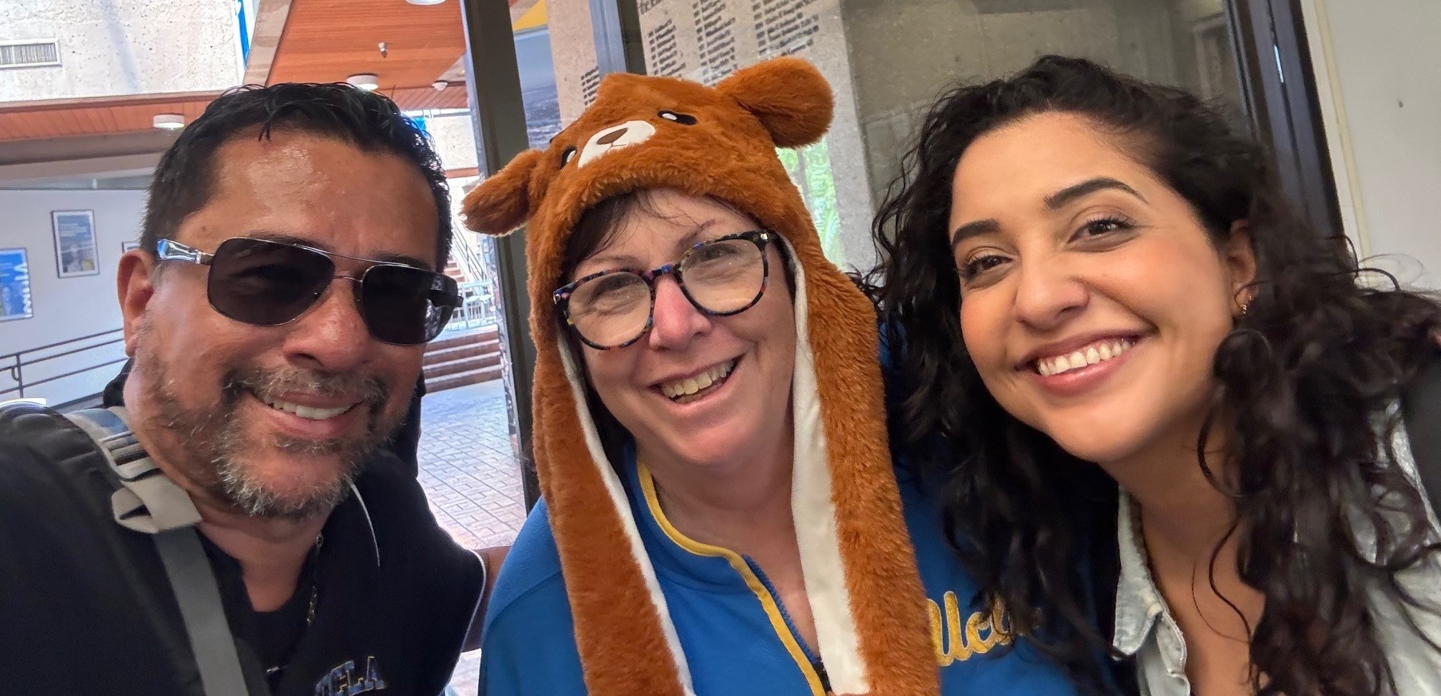 Alumni President Paco Retana ’87, M.S.W. ’90, Julie Sina, Alumni President-Elect Cinthia Flores ’10